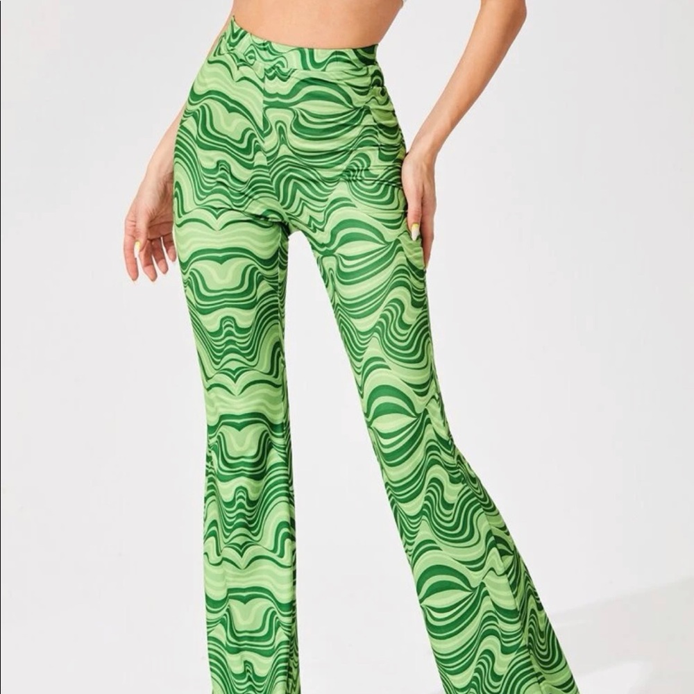 green flair pants with swirly design